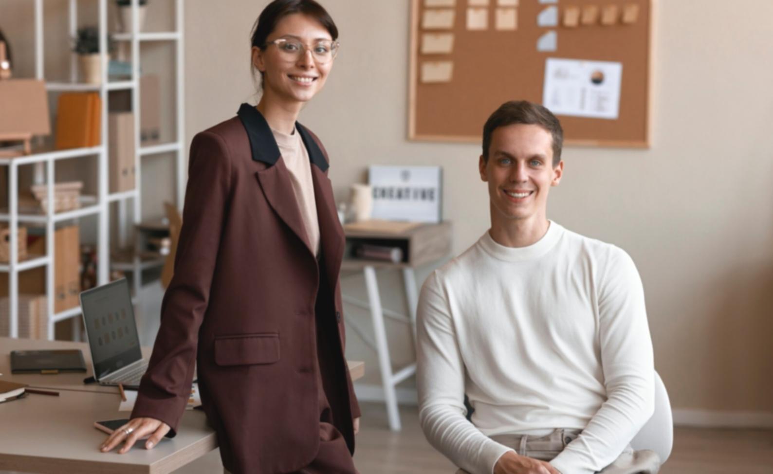 Small business owner reviewing financial reports